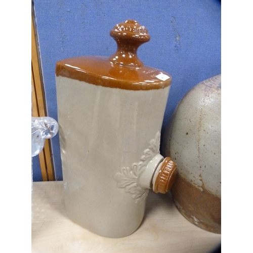 35 - Stoneware pig water bottle, studio pottery flagon with stopper, pottery crock and an oil lamp. ... 