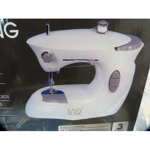 352 - Easy Home Mini sewing machine.