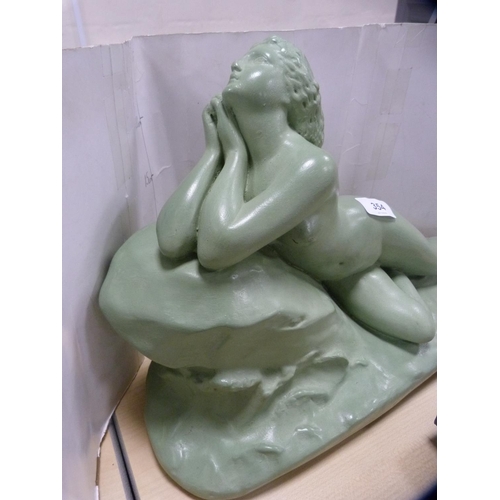 354 - Art Deco-style figure of a reclining maiden.