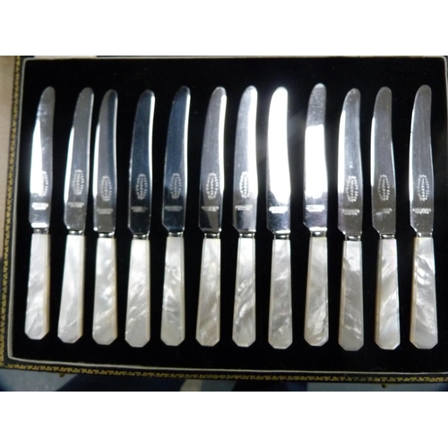 355 - Culinary Concepts olive bowl, set of twelve tea knives and a set of six gateau forks and knives.