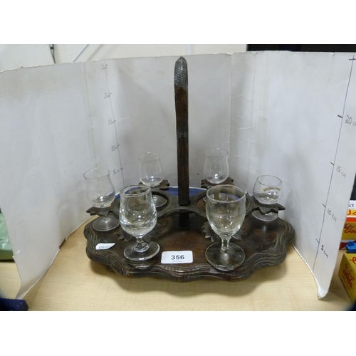 356 - Black Forest-style decanter stand.