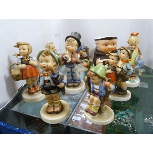 362 - Collection of Hummel figures and a toby jug.