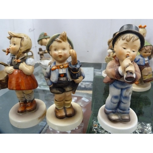 362 - Collection of Hummel figures and a toby jug.