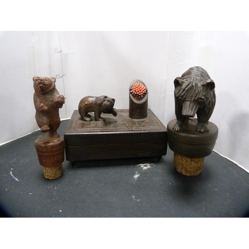 364 - Two Black Forest bear stoppers and a musical box.