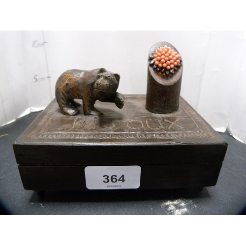 364 - Two Black Forest bear stoppers and a musical box.