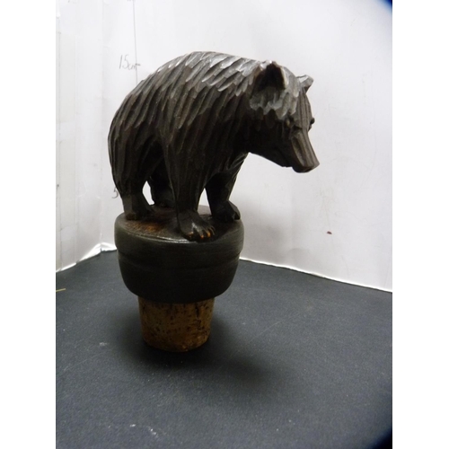 364 - Two Black Forest bear stoppers and a musical box.