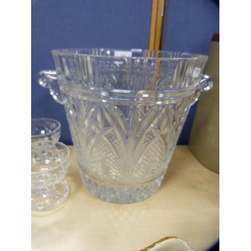 39 - Large cut glass twin-handled ice bucket with star-cut base, a set of cut glass grapefruit dishes and... 