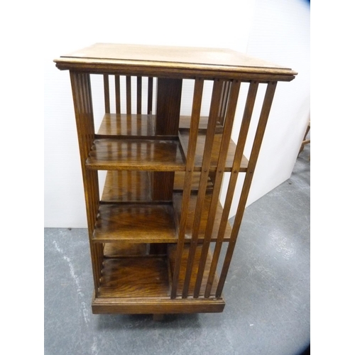 413 - Oak revolving bookcase.