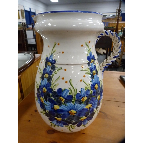 416 - Large pottery glazed jug.