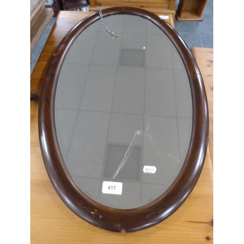 417 - Oval wall mirror.