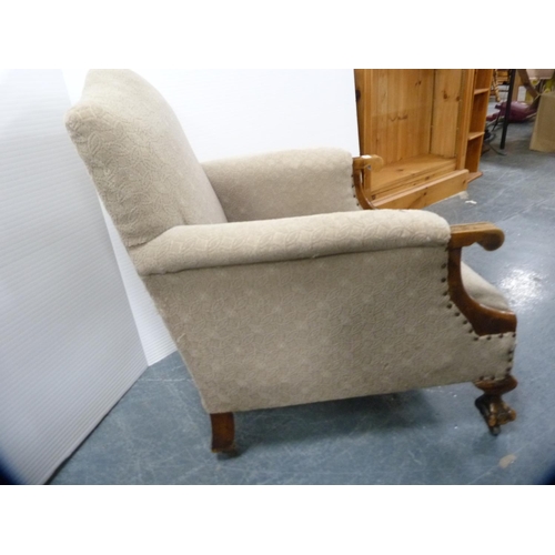 420 - Edwardian armchair on ball and claw supports.