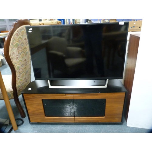 422 - Sony smart TV and a contemporary TV stand.