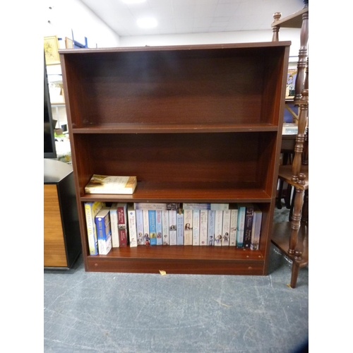 423 - Modern open bookcase containing assorted novels.