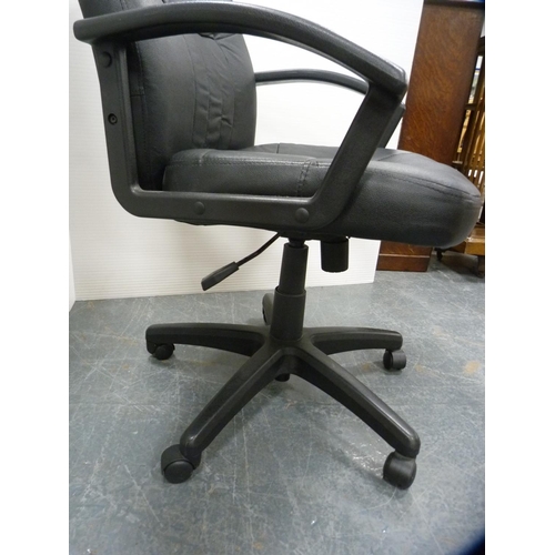 426 - Black revolving office chair.