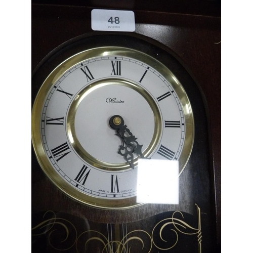 48 - Modern Westclox wall clock.