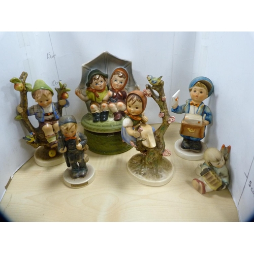 345 - Goebel Hummel figures including Apple Tree Boy and Girl, Chimney Sweep, Postman, Angel playing an Ac... 