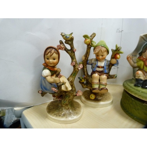 345 - Goebel Hummel figures including Apple Tree Boy and Girl, Chimney Sweep, Postman, Angel playing an Ac... 