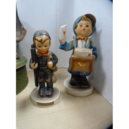 345 - Goebel Hummel figures including Apple Tree Boy and Girl, Chimney Sweep, Postman, Angel playing an Ac... 