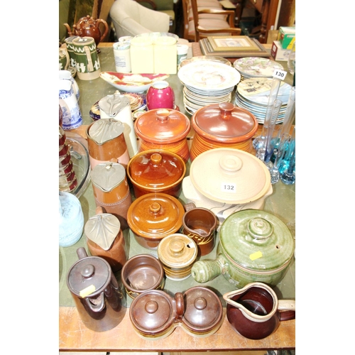 132 - Ceramics to include pots and covers, hot water pots, etc.