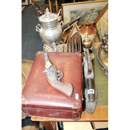 145 - Falkirk Iron, another, a vintage suitcase, a replica gun, a desk tidy, a tea urn, etv.