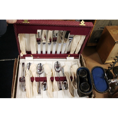 155 - Cased pair of opera glasses and a canteen of cutlery.