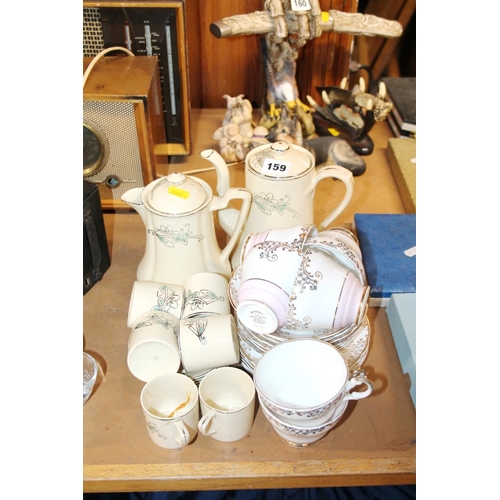 159 - Regency bone china teaset and a Johnson Bros. coffee set.