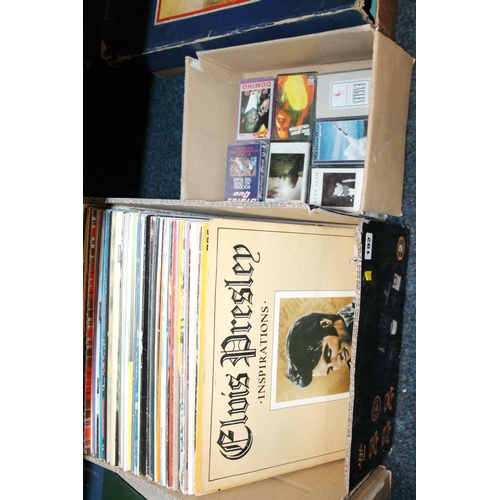 192 - Box containing cassettes to include Bob Marley, Status Quo, and others, and a box of records to incl... 