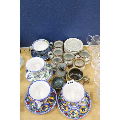 218 - Cup and saucers, stoneware mugs, etc.