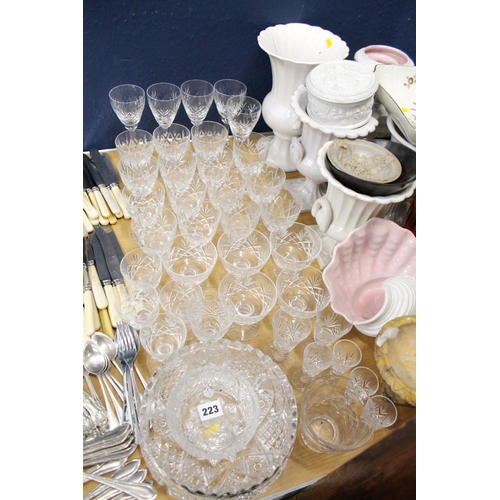 223 - Part suite of cut-crystal glassware to include Stuart Crystal, and others.