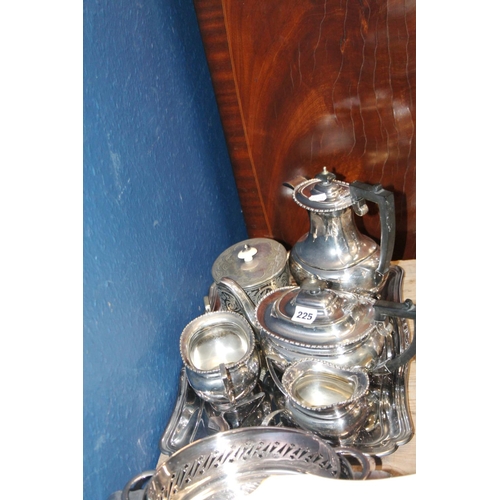 225 - Four piece silver-plated tea service on tray, a biscuit barrel, baskets, etc.