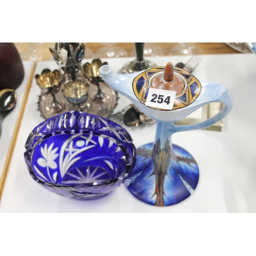 254 - Chameleon ware Aladdin teapot and a Bristol Blue flash-cut glass basket.