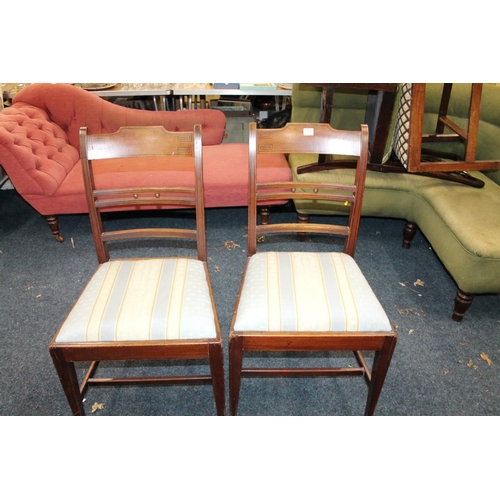 573 - Pair of mahogany cross-banded bar back dining chairs.