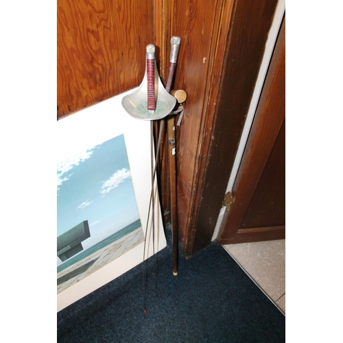 85 - Silver collared walking cane, and two fencing foils.