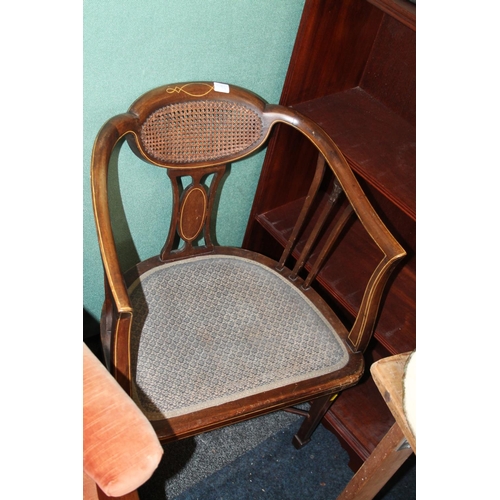 594 - Mahogany and inlaid tub chair, with bergere back.