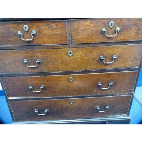 446 - Victorian oak chest of two short and three long drawers with carved back.