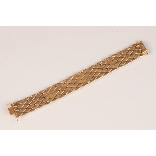 101 - Ladies 18 carat yellow gold broad bracelet, length 20cm, 37g