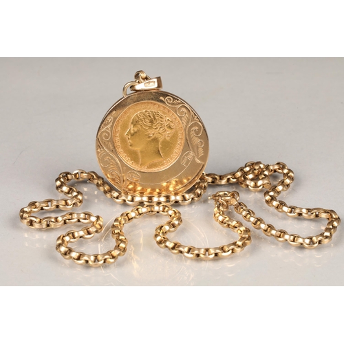 129 - A Victorian 1871 gold sovereign, mounted to a 9 carat gold circular pendant with a 9 carat gold chai... 