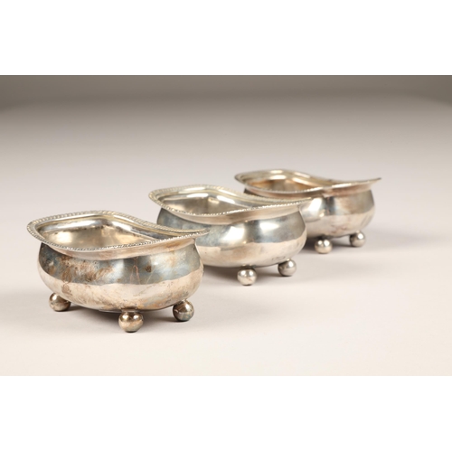 164 - Three George III silver table salts, (no liners) graduated edges, raised on bun feet, assay marked L... 