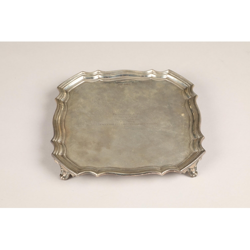 173 - Walker and Hall silver salver, pie crust edge raised on four scroll feet, assay marked Sheffield 196... 