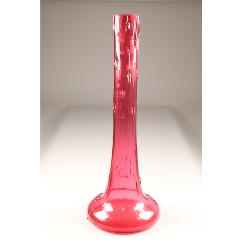 183 - Very large elongated bottle shaped cranberry glass vase, height 82cm