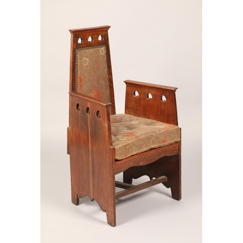 449 - Oak arts and crafts armchair, with pierced heart decoration, width 56.5cm, height 102cm