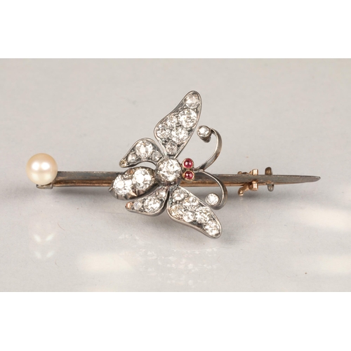 59 - Diamond butterfly brooch, set with old cut diamonds and ruby eyes mounted to an unmarked pin with a ... 