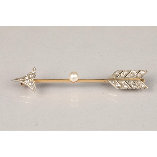 66 - Unmarked gold and diamond bar brooch in the form of an arrow, the arrow head and flight feathers mou... 