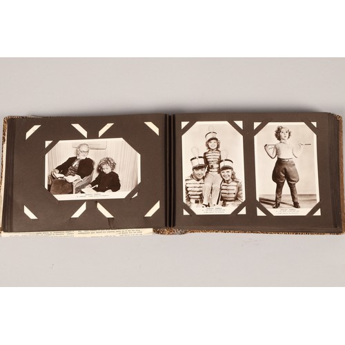 260 - Screen stars album of over 100 black and white postcards, featuring Shirley Temple 20th century fox ... 