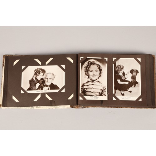 260 - Screen stars album of over 100 black and white postcards, featuring Shirley Temple 20th century fox ... 