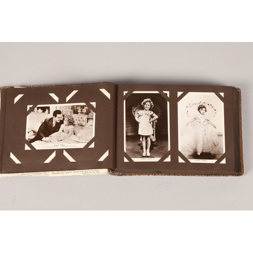 260 - Screen stars album of over 100 black and white postcards, featuring Shirley Temple 20th century fox ... 