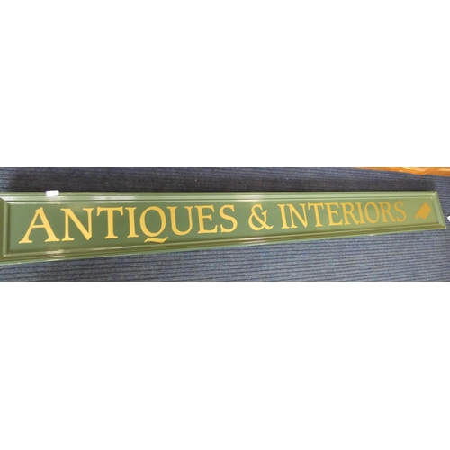 358 - Large long 'Antiques and Interiors' sign.