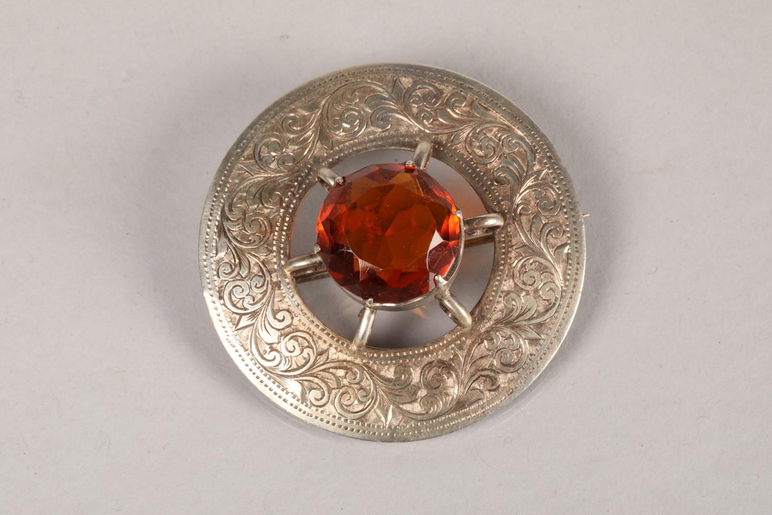 Hallmarked silver and amber Celtic design brooch