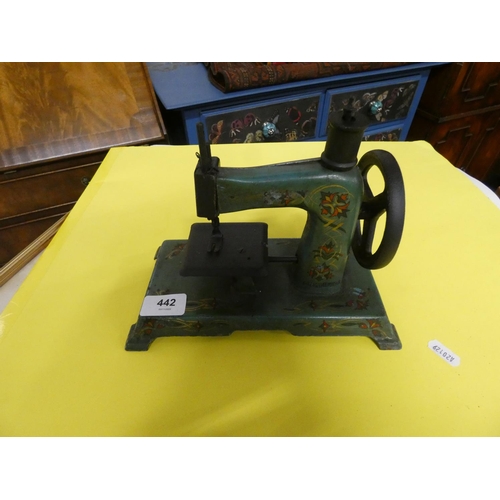 442 - Antique child's tin plate sewing machine.