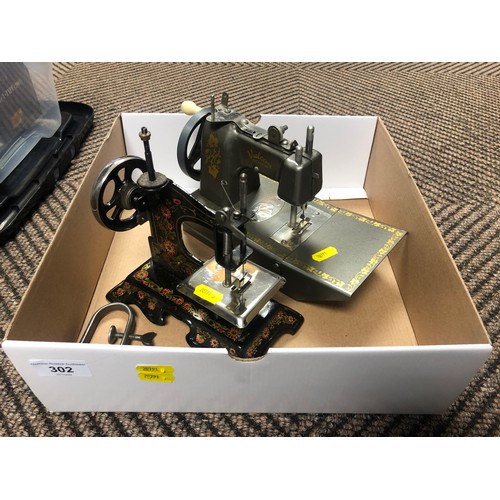 Childs Vulcan sewing machine; together with one other sewing machine